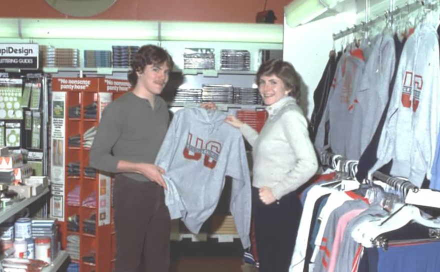Bookstore 1983 Students hold up merchandise in the UC Clermont Bookstore, 1983.