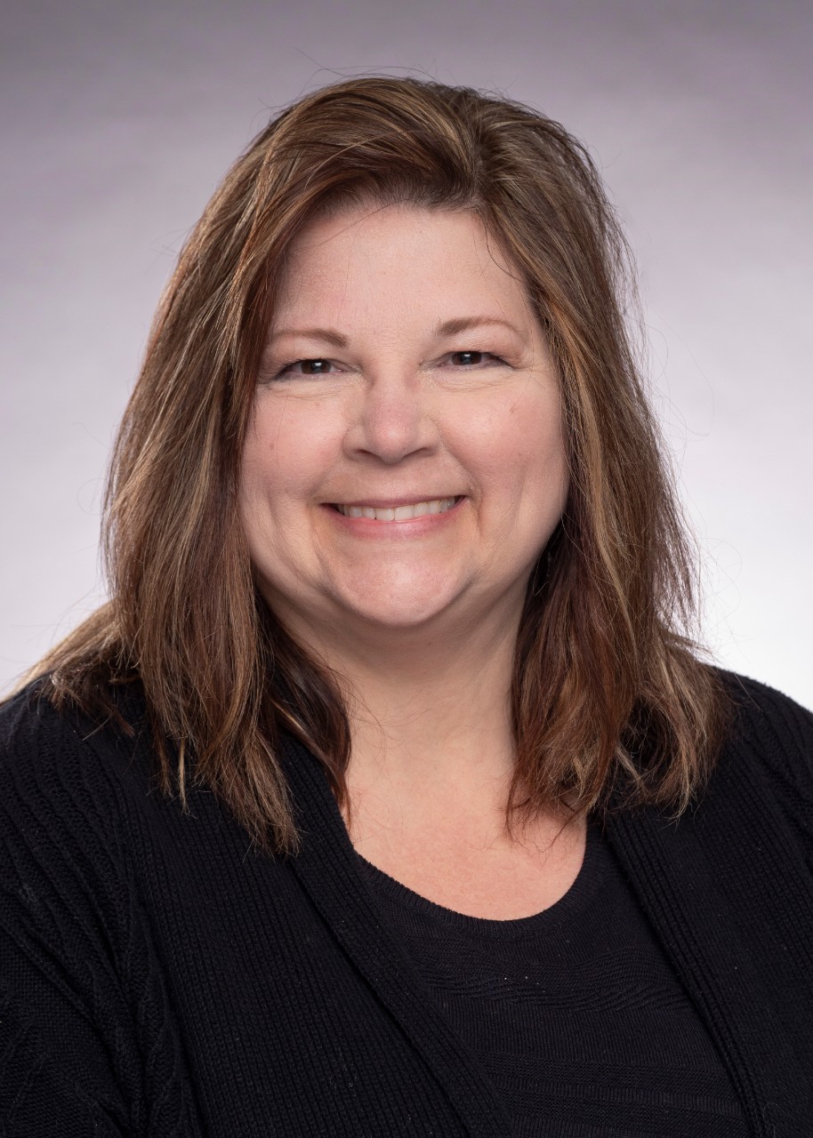 Headshot of Carol Adams
