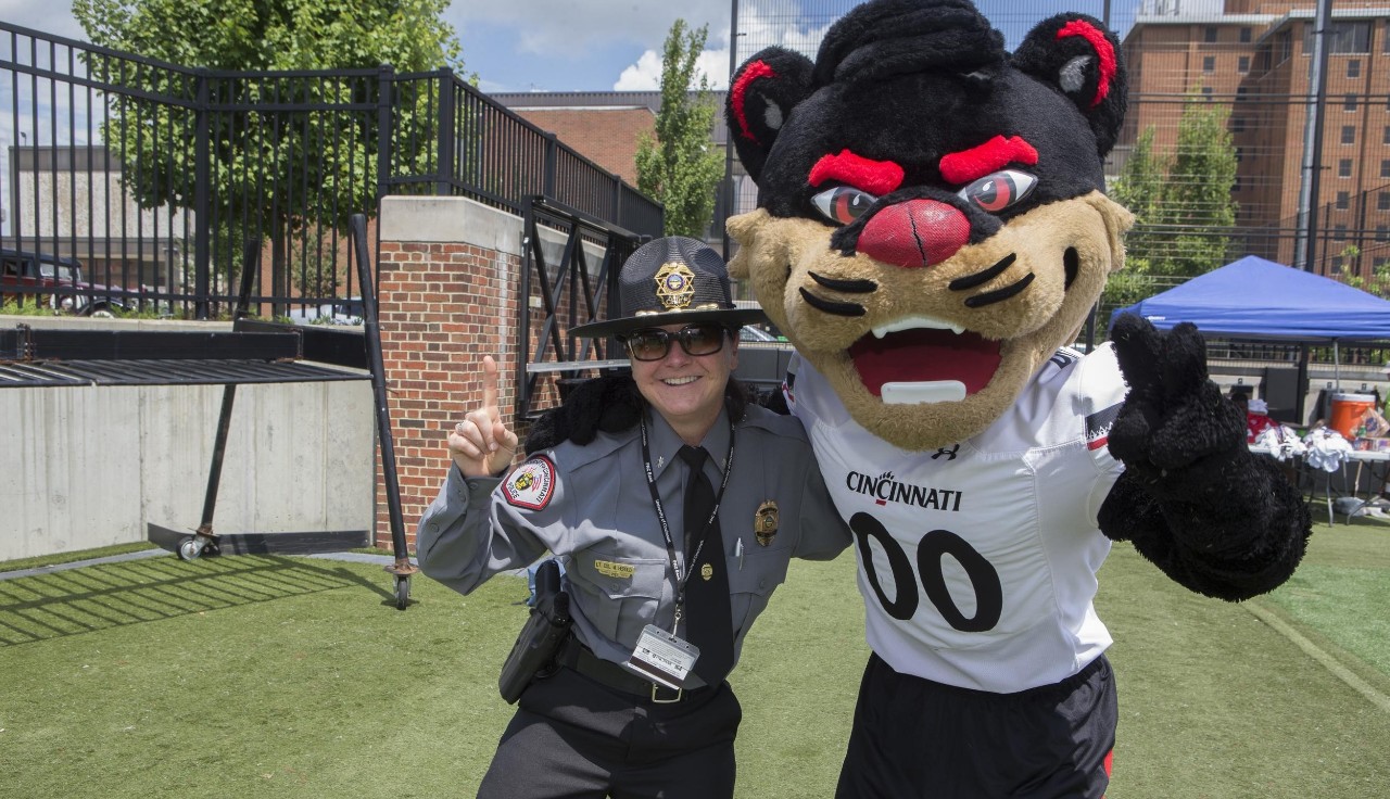 UCPD interacting with kids at Peace Bowl and ceremony at Sheakley Field UC/Joseph Fuqua II 
