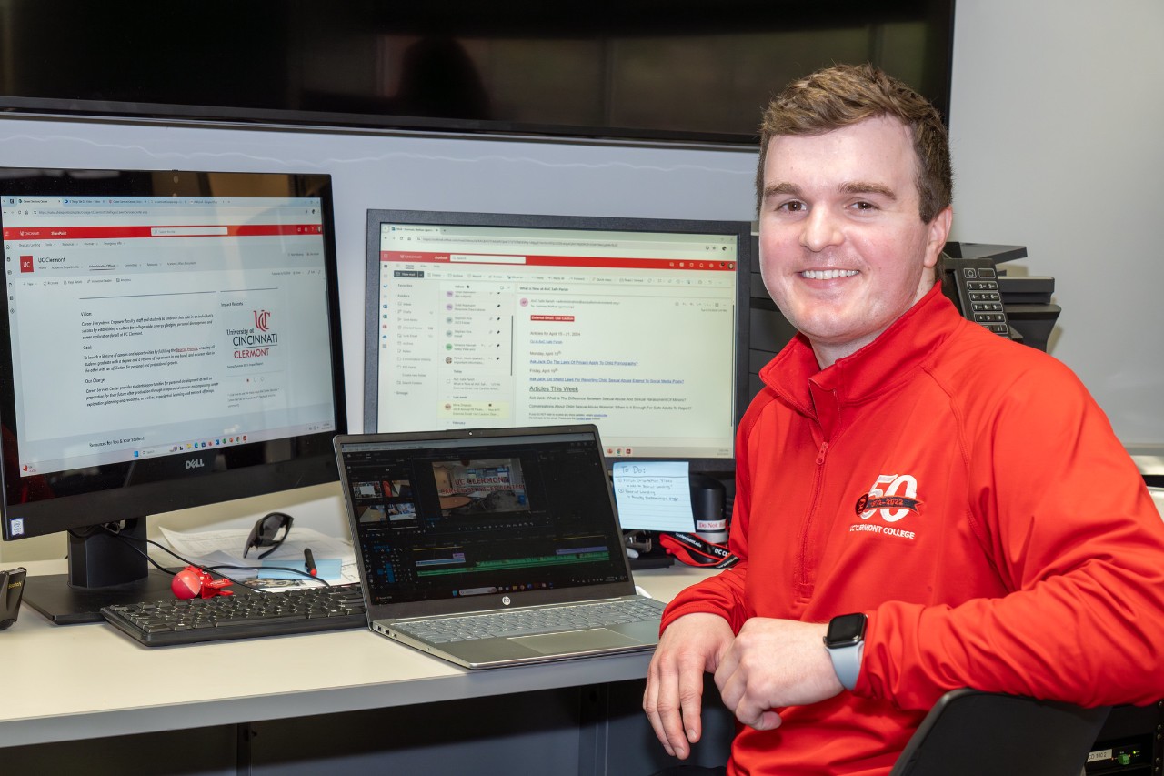 Nathan Gorman works at computers during his Cronin Scholars internship in UC Clermont's Career Services.